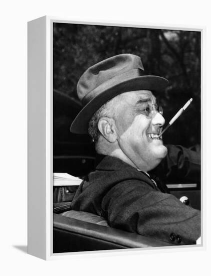 President Franklin Roosevelt, Debonair with His Cigarette Holder, 1939-null-Framed Stretched Canvas