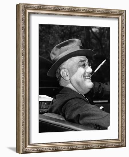 President Franklin Roosevelt, Debonair with His Cigarette Holder, 1939-null-Framed Photo