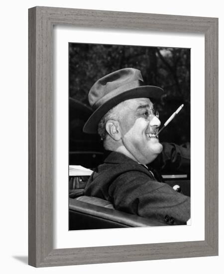 President Franklin Roosevelt, Debonair with His Cigarette Holder, 1939-null-Framed Photo