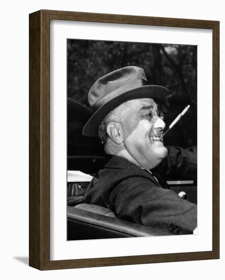 President Franklin Roosevelt, Debonair with His Cigarette Holder, 1939-null-Framed Photo