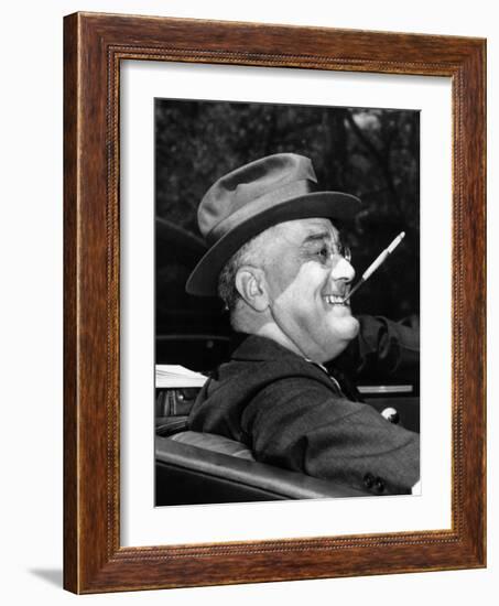 President Franklin Roosevelt, Debonair with His Cigarette Holder, 1939-null-Framed Photo