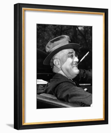 President Franklin Roosevelt, Debonair with His Cigarette Holder, 1939-null-Framed Photo