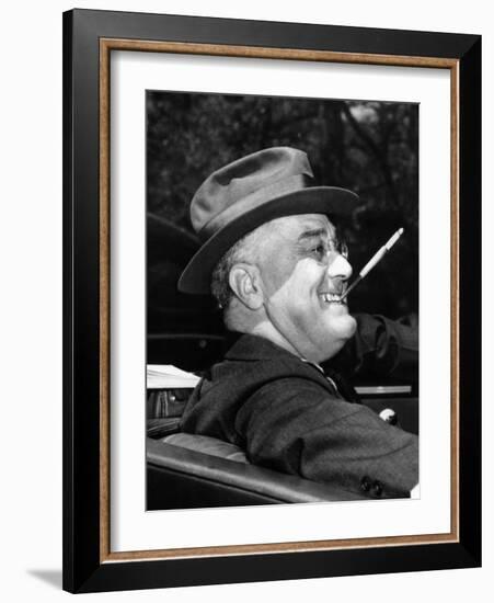 President Franklin Roosevelt, Debonair with His Cigarette Holder, 1939-null-Framed Photo