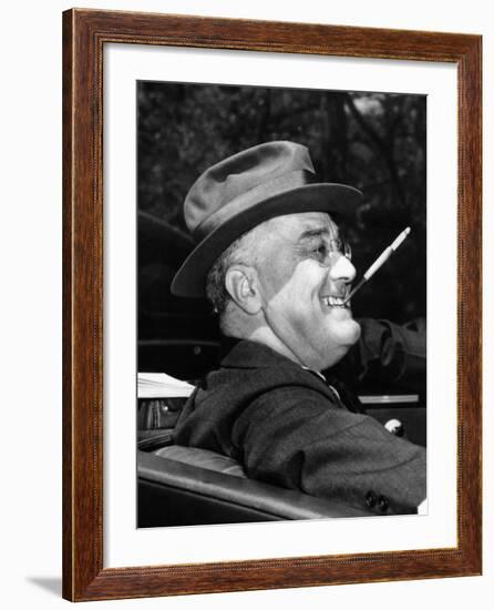 President Franklin Roosevelt, Debonair with His Cigarette Holder, 1939-null-Framed Photo