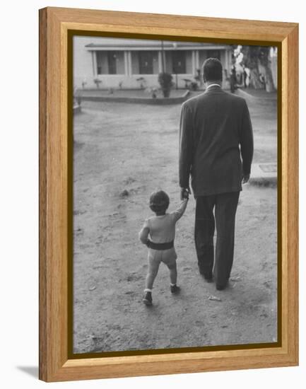 President Gamal Abdul Nasser at His Home with His Small Son Just after Port Said Invasion-Howard Sochurek-Framed Premier Image Canvas