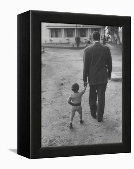 President Gamal Abdul Nasser at His Home with His Small Son Just after Port Said Invasion-Howard Sochurek-Framed Premier Image Canvas