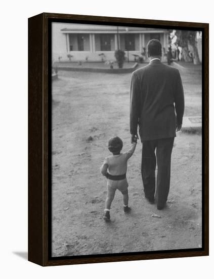 President Gamal Abdul Nasser at His Home with His Small Son Just after Port Said Invasion-Howard Sochurek-Framed Premier Image Canvas