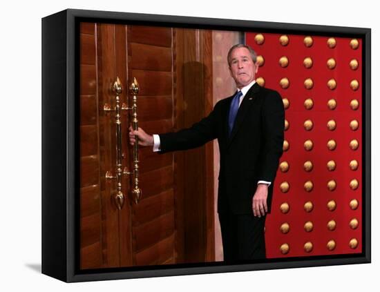 President George W. Bush as He Tries to Open a Locked Door Leaving a Press Conference in Beijing-null-Framed Premier Image Canvas