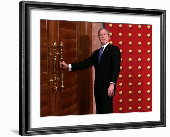 President George W. Bush as He Tries to Open a Locked Door Leaving a Press Conference in Beijing-null-Framed Photographic Print