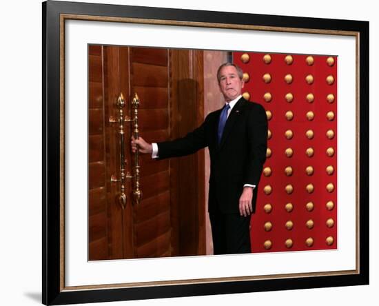 President George W. Bush as He Tries to Open a Locked Door Leaving a Press Conference in Beijing-null-Framed Photographic Print