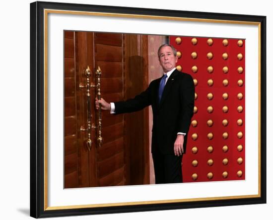 President George W. Bush as He Tries to Open a Locked Door Leaving a Press Conference in Beijing-null-Framed Photographic Print