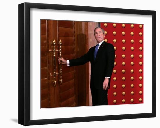 President George W. Bush as He Tries to Open a Locked Door Leaving a Press Conference in Beijing-null-Framed Photographic Print