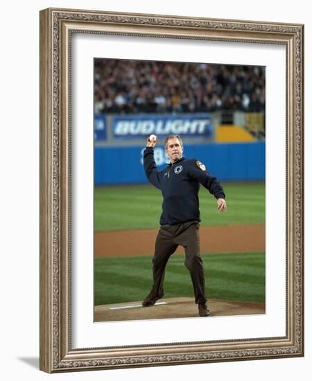 President George W. Bush Throws the Ceremonial First Pitch at Yankee Stadium-null-Framed Photo