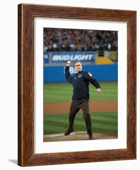 President George W. Bush Throws the Ceremonial First Pitch at Yankee Stadium-null-Framed Photo