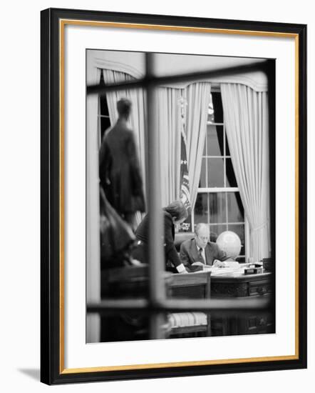 President Gerald Ford Working at His Desk, Washington, D.C., 1975-Marion S^ Trikosko-Framed Photo