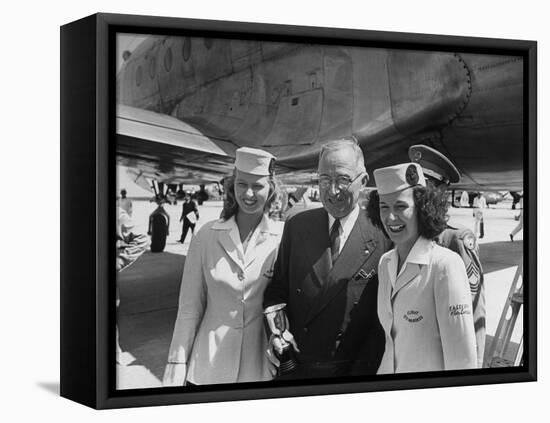 President Harry S. Truman Standing Near a Plane Flanked by Stewardesses-null-Framed Premier Image Canvas