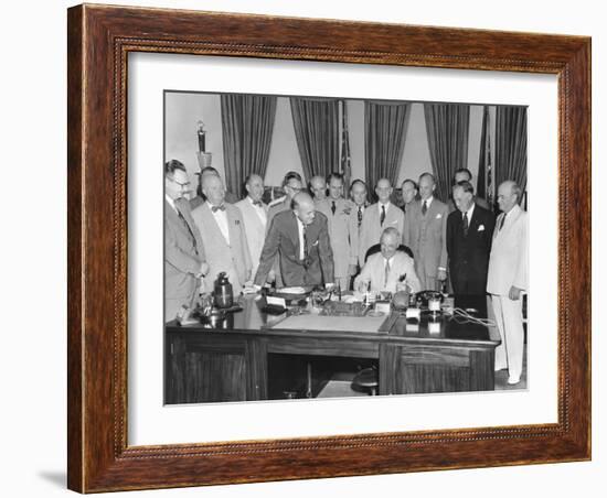 President Harry Truman Signing H.R. 5632, the National Security Act Amendments of 1949-null-Framed Photo