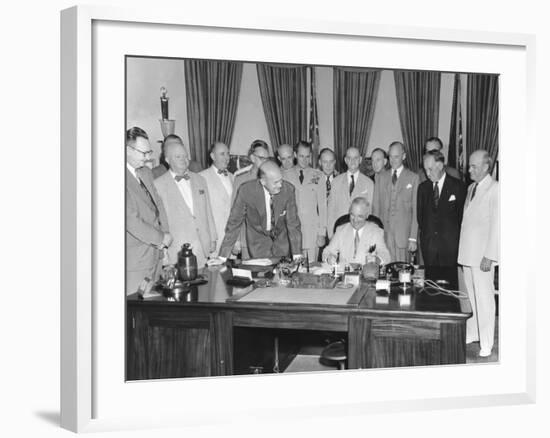 President Harry Truman Signing H.R. 5632, the National Security Act Amendments of 1949-null-Framed Photo