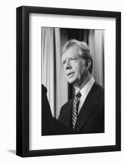 President Jimmy Carter announces sanctions against Iran in retaliation for taking US hostages, 1980-Marion S. Trikosko-Framed Photographic Print