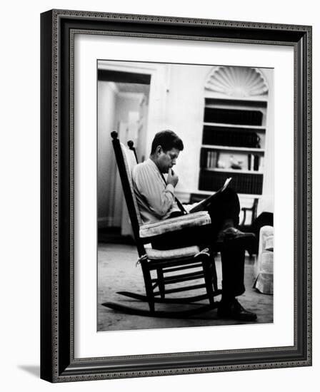 President John F. Kennedy Sitting Alone, Thoughtfully, in His Rocking Chair in the Oval Office-Paul Schutzer-Framed Photographic Print