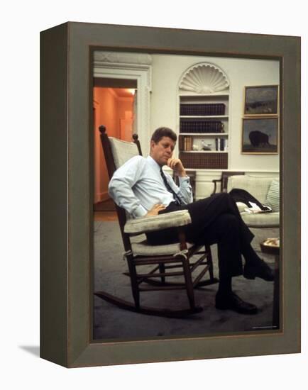 President John F. Kennedy Sitting in Rocking Chair in His White House Office-Paul Schutzer-Framed Premier Image Canvas