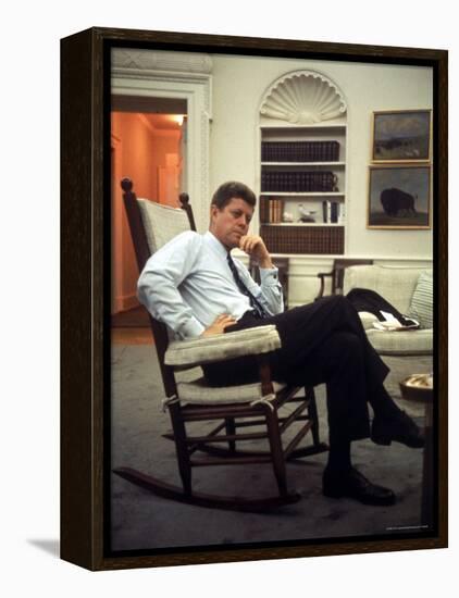 President John F. Kennedy Sitting in Rocking Chair in His White House Office-Paul Schutzer-Framed Premier Image Canvas