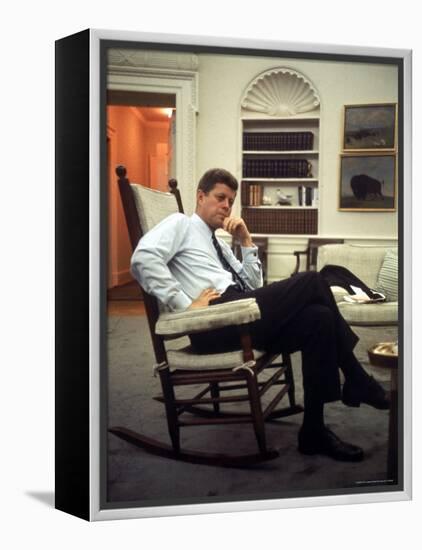 President John F. Kennedy Sitting in Rocking Chair in His White House Office-Paul Schutzer-Framed Premier Image Canvas