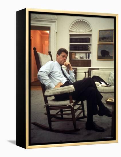 President John F. Kennedy Sitting in Rocking Chair in His White House Office-Paul Schutzer-Framed Premier Image Canvas