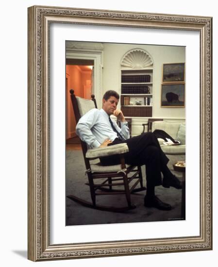 President John F. Kennedy Sitting in Rocking Chair in His White House Office-Paul Schutzer-Framed Photographic Print