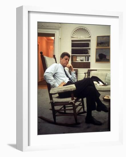 President John F. Kennedy Sitting in Rocking Chair in His White House Office-Paul Schutzer-Framed Photographic Print