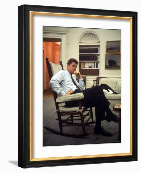 President John F. Kennedy Sitting in Rocking Chair in His White House Office-Paul Schutzer-Framed Photographic Print