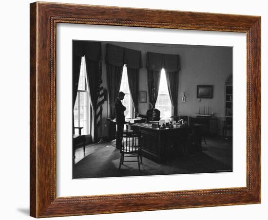 President John F. Kennedy Speaking with Brother, Attorney General Robert F. Kennedy-Art Rickerby-Framed Photographic Print