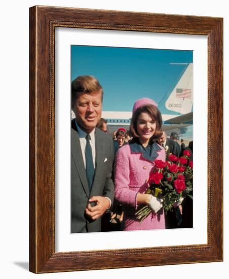 President John F. Kennedy Standing with Wife Jackie After Their Arrival at the Airport-Art Rickerby-Framed Photographic Print