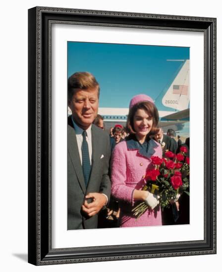 President John F. Kennedy Standing with Wife Jackie After Their Arrival at the Airport-Art Rickerby-Framed Photographic Print