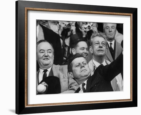 President John F. Kennedy Tossing Out 1st Ball of Baseball Season at Senators Game-Joe Scherschel-Framed Photographic Print