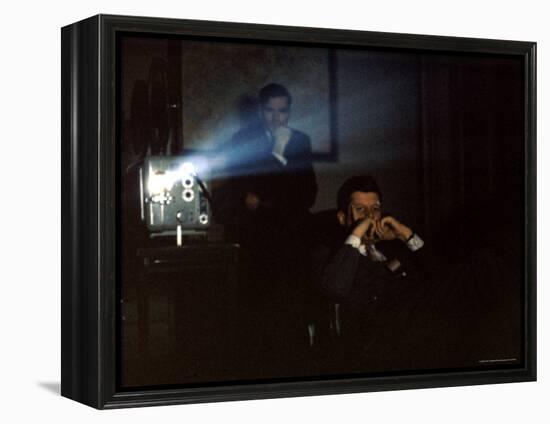 President John F. Kennedy Viewing a Film in Press Secretary Pierre Salinger's Office-Paul Schutzer-Framed Premier Image Canvas