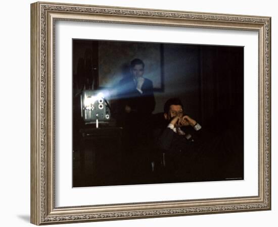 President John F. Kennedy Viewing a Film in Press Secretary Pierre Salinger's Office-Paul Schutzer-Framed Photographic Print