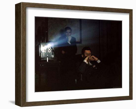 President John F. Kennedy Viewing a Film in Press Secretary Pierre Salinger's Office-Paul Schutzer-Framed Photographic Print