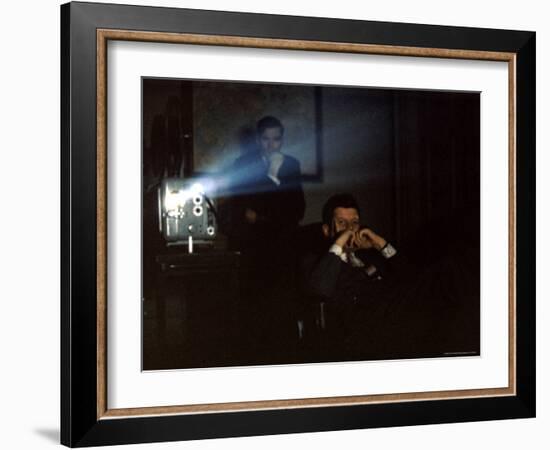 President John F. Kennedy Viewing a Film in Press Secretary Pierre Salinger's Office-Paul Schutzer-Framed Photographic Print