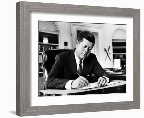 President John F. Kennedy Working at His Desk in the Oval Office of the White House-Alfred Eisenstaedt-Framed Photographic Print