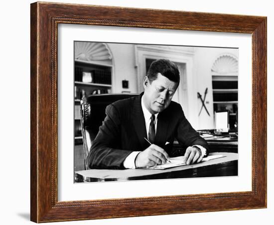 President John F. Kennedy Working at His Desk in the Oval Office of the White House-Alfred Eisenstaedt-Framed Photographic Print