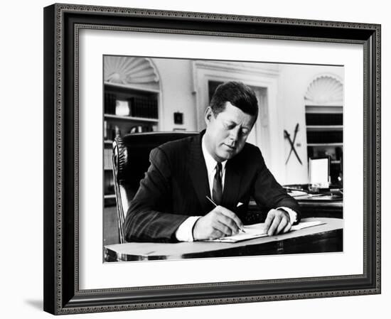 President John F. Kennedy Working at His Desk in the Oval Office of the White House-Alfred Eisenstaedt-Framed Photographic Print