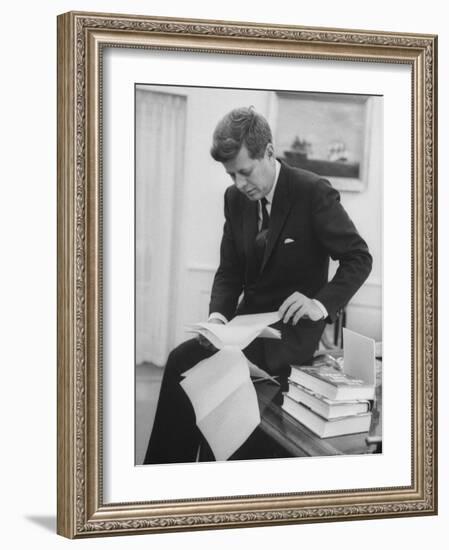 President John F. Kennedy Working in the White House Office-null-Framed Photographic Print