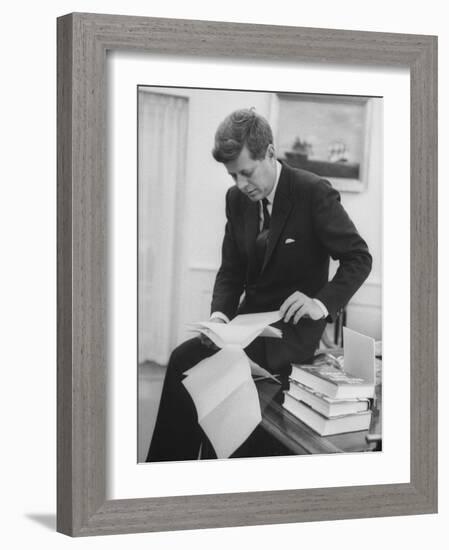 President John F. Kennedy Working in the White House Office-null-Framed Photographic Print