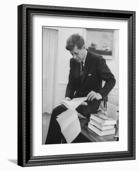 President John F. Kennedy Working in the White House Office-null-Framed Photographic Print