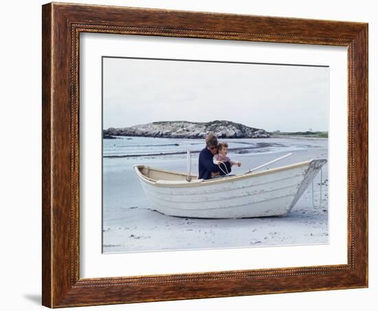 President John Kennedy and John Jr. Play in a Beached Rowboat at Newport, Rhode Island. 1962-null-Framed Photo