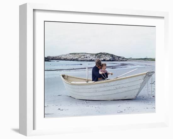 President John Kennedy and John Jr. Play in a Beached Rowboat at Newport, Rhode Island. 1962-null-Framed Photo