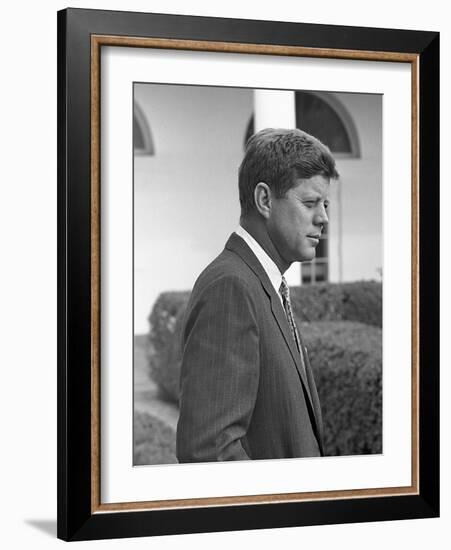 President John Kennedy in the White House Rose Garden. Oct. 24, 1961-null-Framed Photo