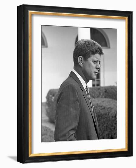 President John Kennedy in the White House Rose Garden. Oct. 24, 1961-null-Framed Photo