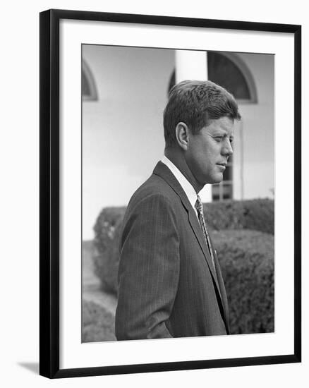 President John Kennedy in the White House Rose Garden. Oct. 24, 1961-null-Framed Photo